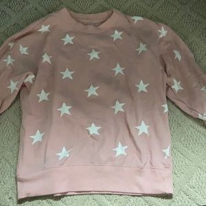 Pink crew neck sweatshirt with white star details